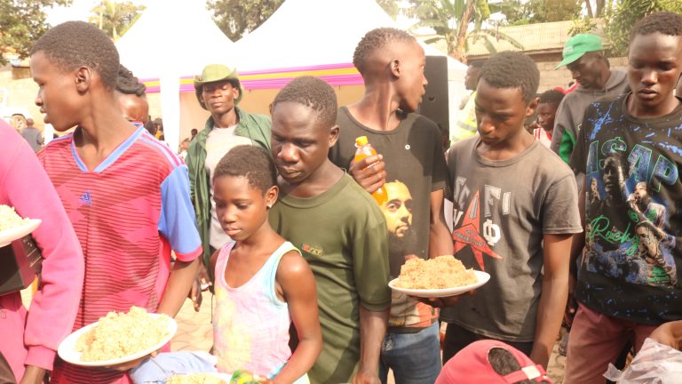 Feeding is one of the most immediate and powerful ways they show care. During their annual Street Children Christmas feast, boys (and often girls and other community members too) gather for a proper meal, new clothes, music, and celebration.